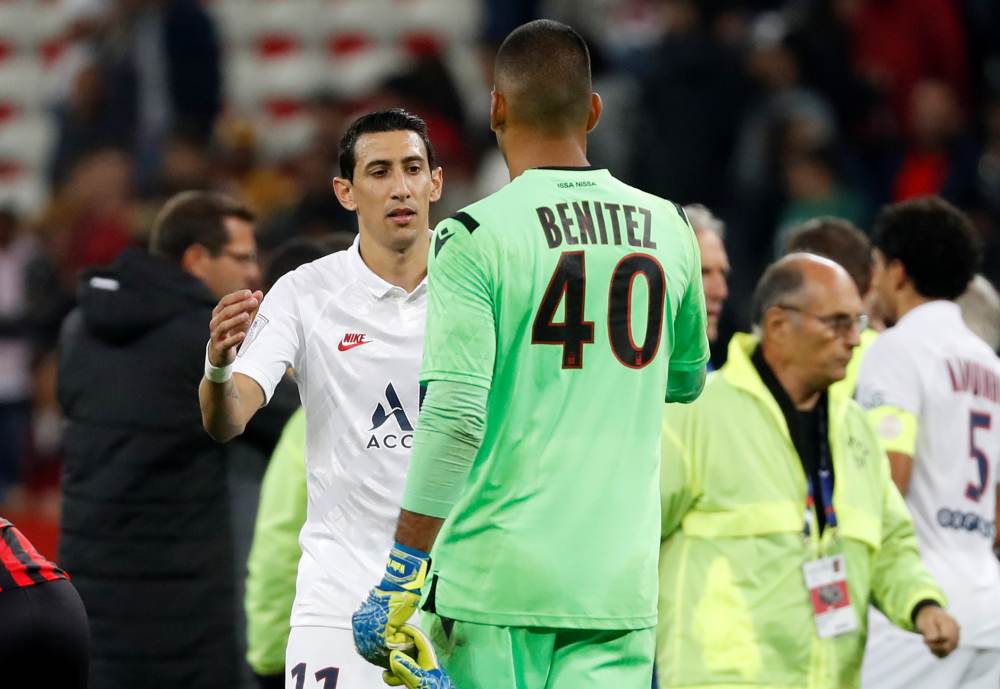 Paris St Germain's Angel Di Maria with OGC Nice's Walter Benitez after the match, October 18, 2019. u00e2u20acu2022 Reuters pic