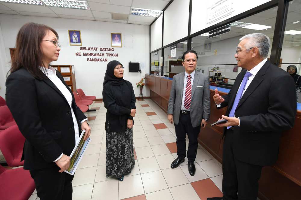 Chief Justice Tan Sri Tengku Maimun Tuan Mat (second left) at the the Sandakan Court today, October 21, 2019. u00e2u20acu2022 Bernama pic
