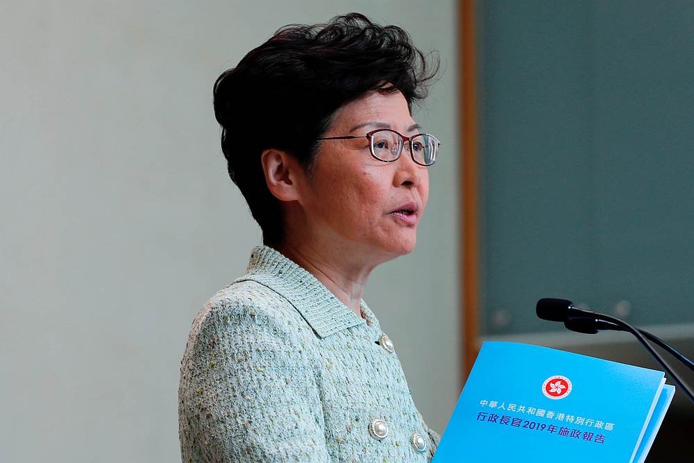 Hong Kong Chief Executive Carrie Lam holds copies of her annual policy address to journalists before a weekly Executive Council meeting in Hong Kong October 15, 2019. u00e2u20acu201d Reuters pic