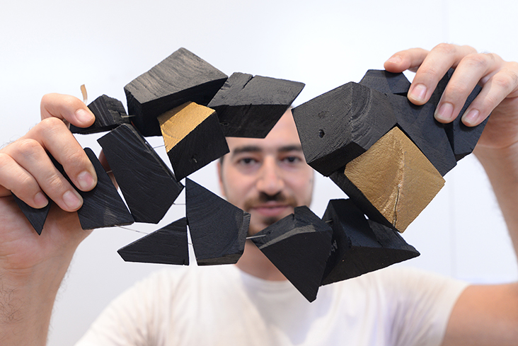 Aboud Fares with his work titled 'Unity'