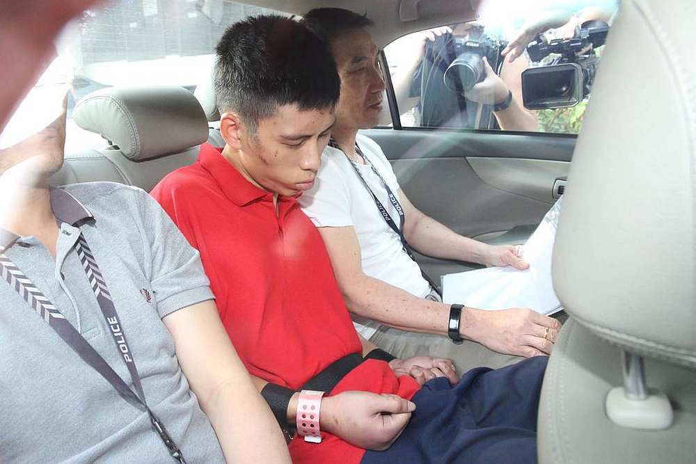 Gabriel Lien Goh, 22, entering the Singapore State Courts on October 28. u00e2u20acu201d TODAY pic