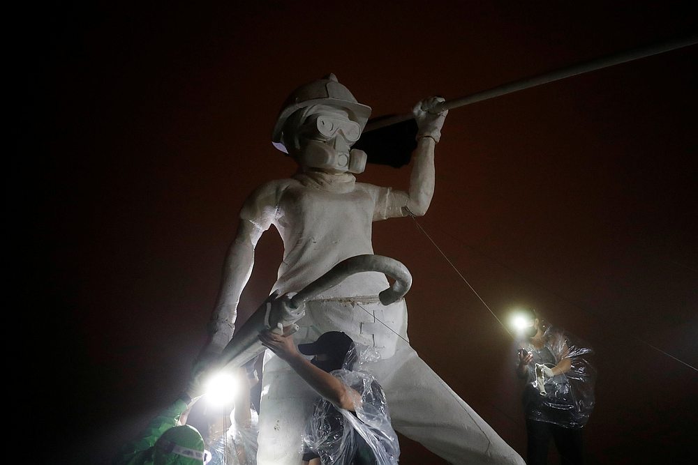 Anti-government protesters set up a three-metre tall 'Statue of Lady Liberty Hong Kong' on the iconic Lion Rock, in Hong Kong October 13, 2019. u00e2u20acu201d Reuters pic