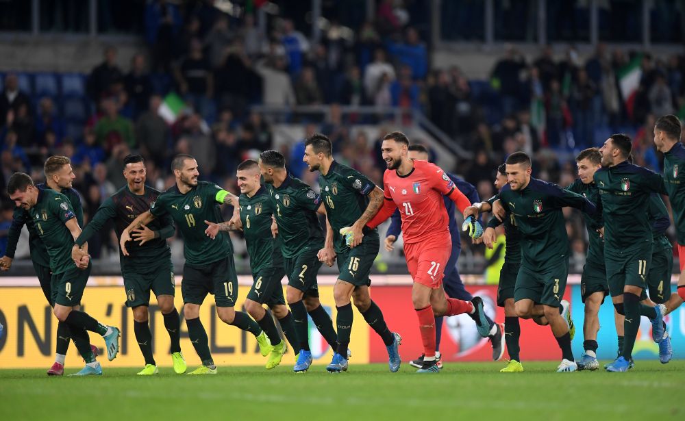 Italy players celebrate after the match against Greece. u00e2u20acu201d Reuters pic