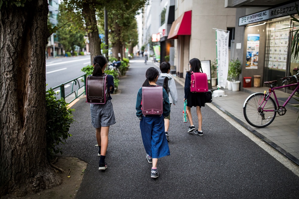 In this picture taken on October 7, 2019, school children walk home along a road in the Ogikubo district of Tokyo. u00e2u20acu201d AFP pic