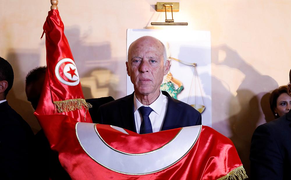 Tunisian presidential candidate Kais Saied reacts after exit poll results for the runoff of the presidential election in Tunis October 13, 2019. u00e2u20acu201d Reuters pic