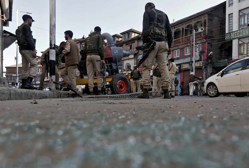 Indian police officers stand at the site of a grenade attack in Srinagar October 12, 2019. u00e2u20acu201d Reuters pic