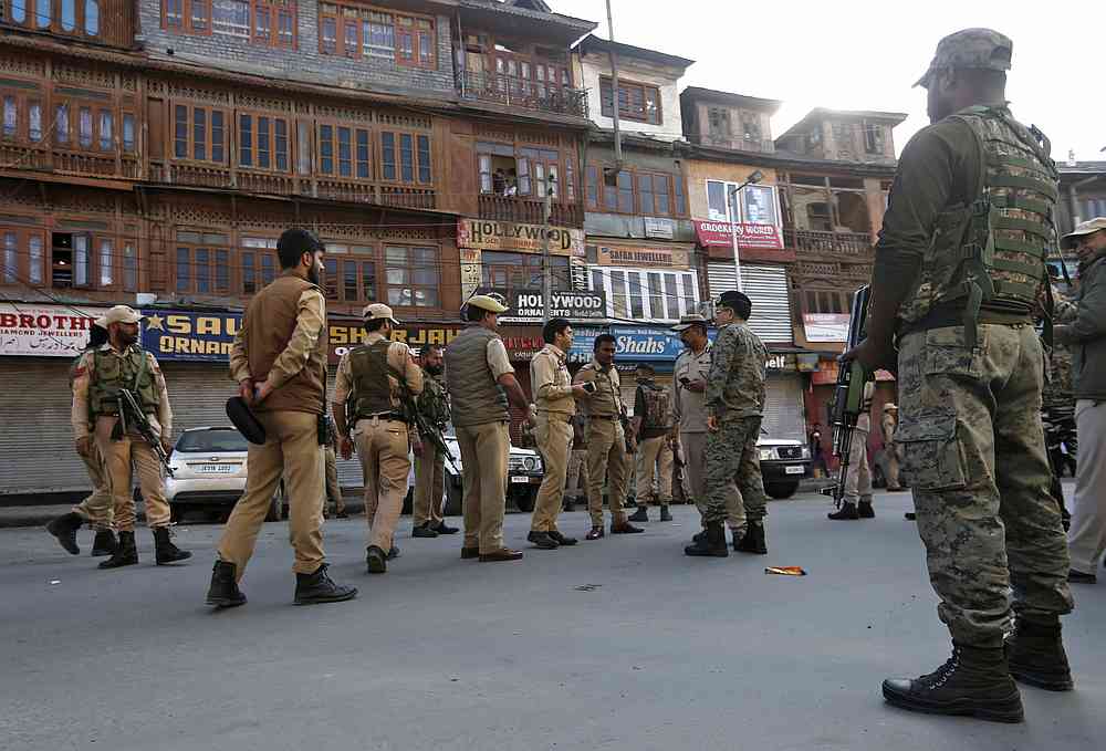 Indian police officers stand at the site of a grenade attack in Srinagar October 12, 2019. u00e2u20acu201d Reuters pic