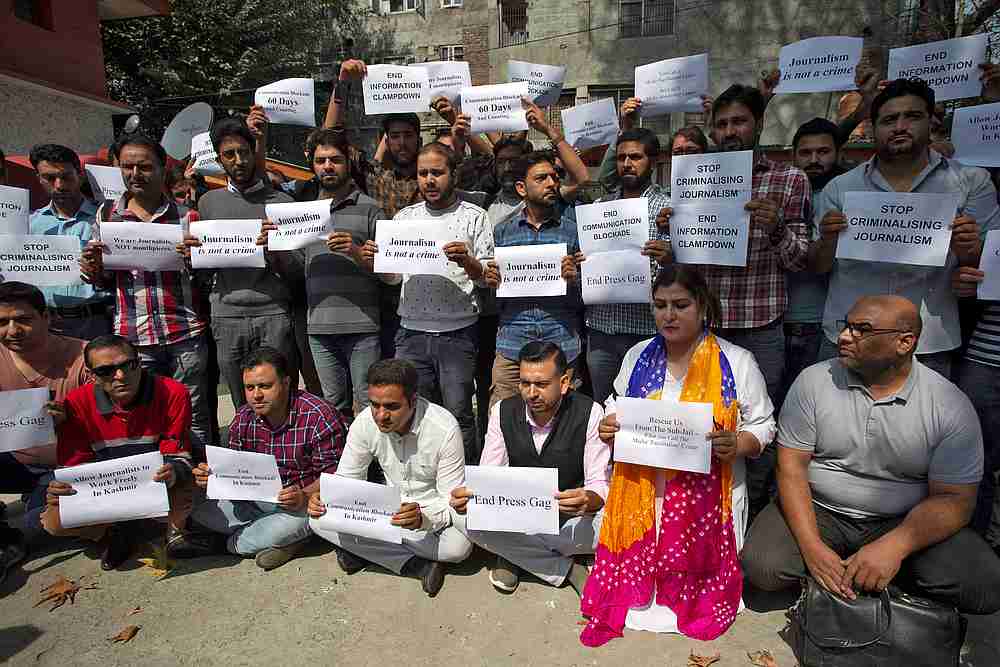 Journalists hold placards during a silent protest against the communication blockade, following the scrapping of the special constitutional status for Kashmir by the Indian government, in Srinagar October 3, 2019. u00e2u20acu201d Reuters pic