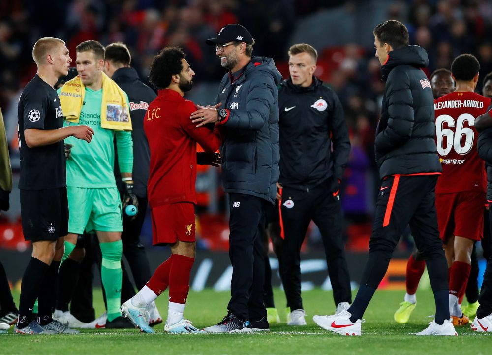 Liverpool manager Jurgen Klopp and Liverpool's Mohamed Salah celebrate after the match against Salzburg. u00e2u20acu201d Reuters pic