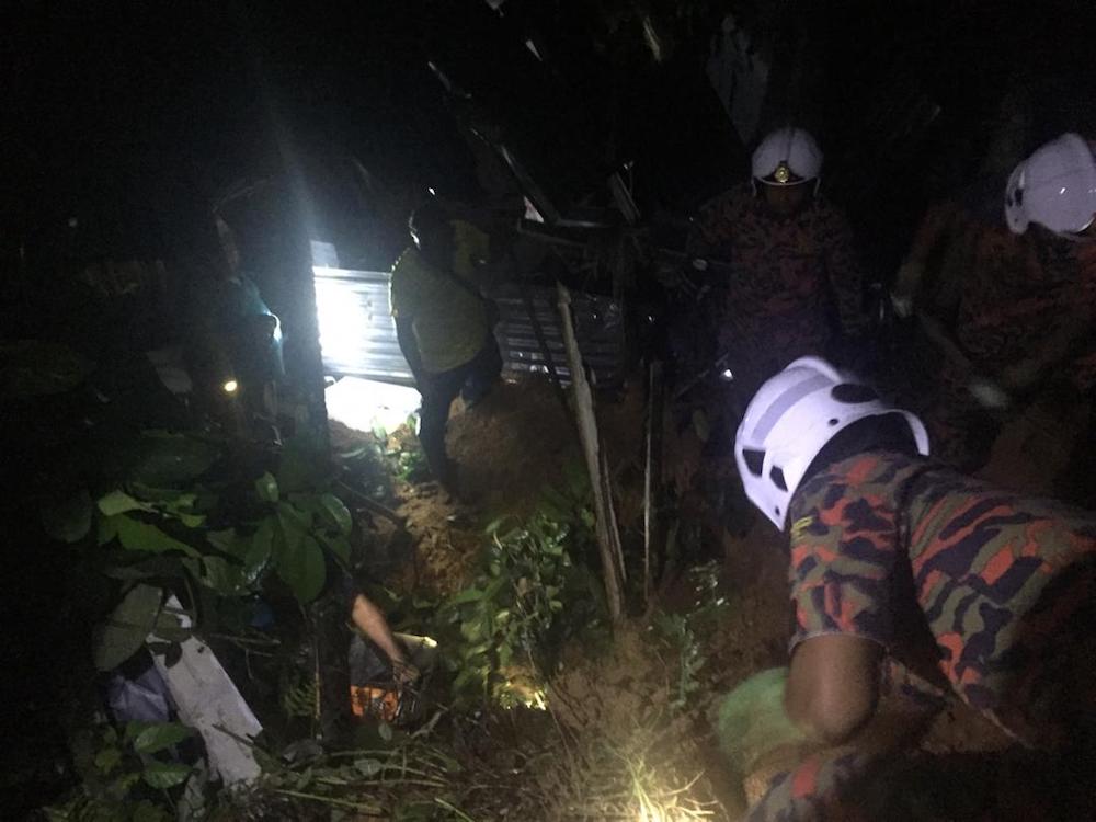 Selama district police chief DSP Mohd Sabri Saad identified the victim as Hanudin Bahazim, 60, who was buried alive alive after his house was hit by landslide in Kampung Teras, Ijok, near Batu Kurau October 25, 2019. u00e2u20acu201d Picture via Twitter/Bernamadotcom