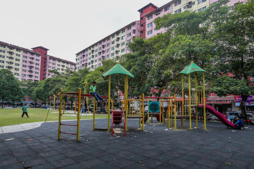 Children are often neglected by parents who are busy working to earn a decent living. — Picture by Firdaus Latif