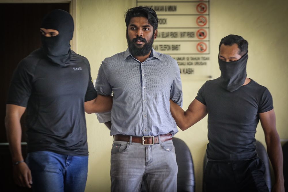 Suspected Liberation Tigers of Tamil Eelam sympathiser A. Kalaimughilan arrives at the Selayang Sessions Court October 29, 2019. — Picture by Hari Anggara