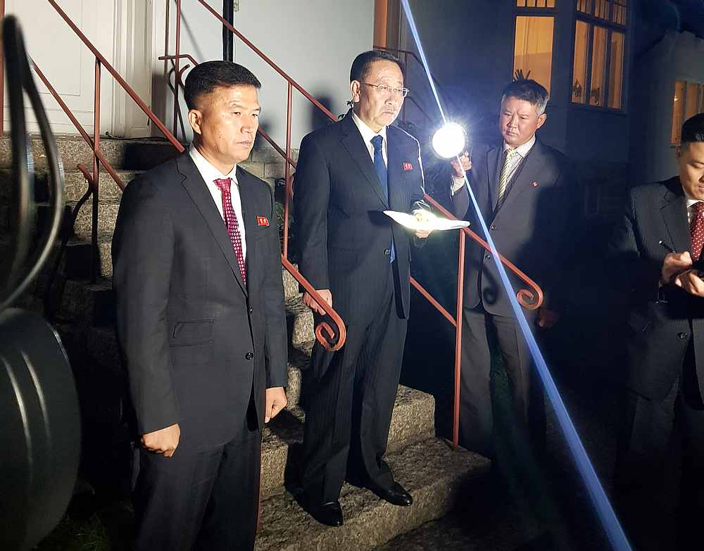 North Korea's chief nuclear negotiator Kim Myong-gil (second left) is seen outside the North Korean embassy in Stockholm, Sweden October 5, 2019. u00e2u20acu201d Reuters pic