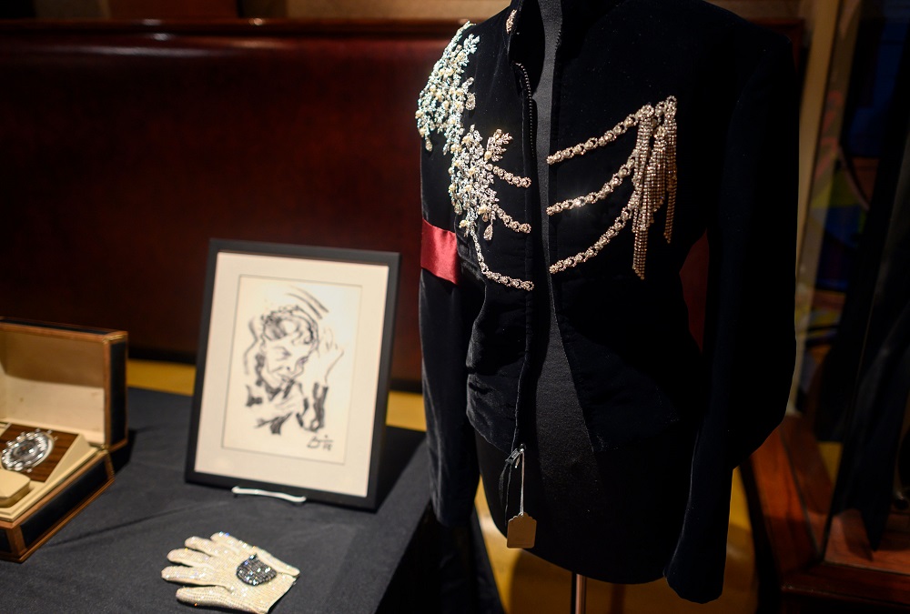 A custom velvet jacket worn by Michael Jackson at Elizabeth Taylor’s 65th birthday party is on display at the Hard Rock Cafe in New York ahead of the auction at Julien’s Auctions October 21, 2019. — AFP pic