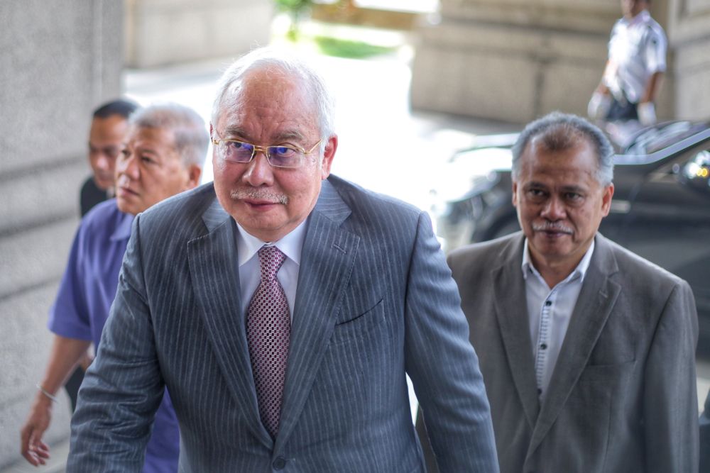 Datuk Seri Najib Razak arrives at the Kuala Lumpur High Court October 29, 2019. u00e2u20acu201d Picture by Ahmad Zamzahurin