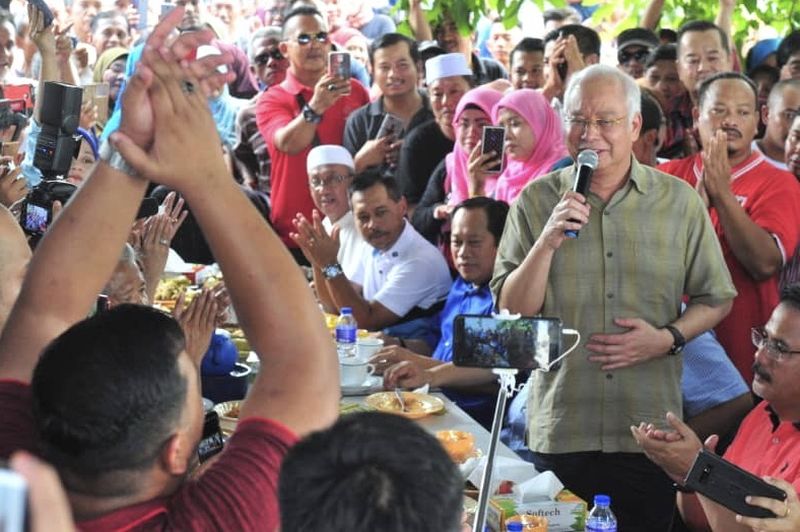 Datuk Seri Najib Razak addressing the crowds at his first stop at Kedai Makanan dan Minumam Farhan in Jalan Kukup in Tanjung Piai October 4, 2019. u00e2u20acu201d Picture by Ben Tan