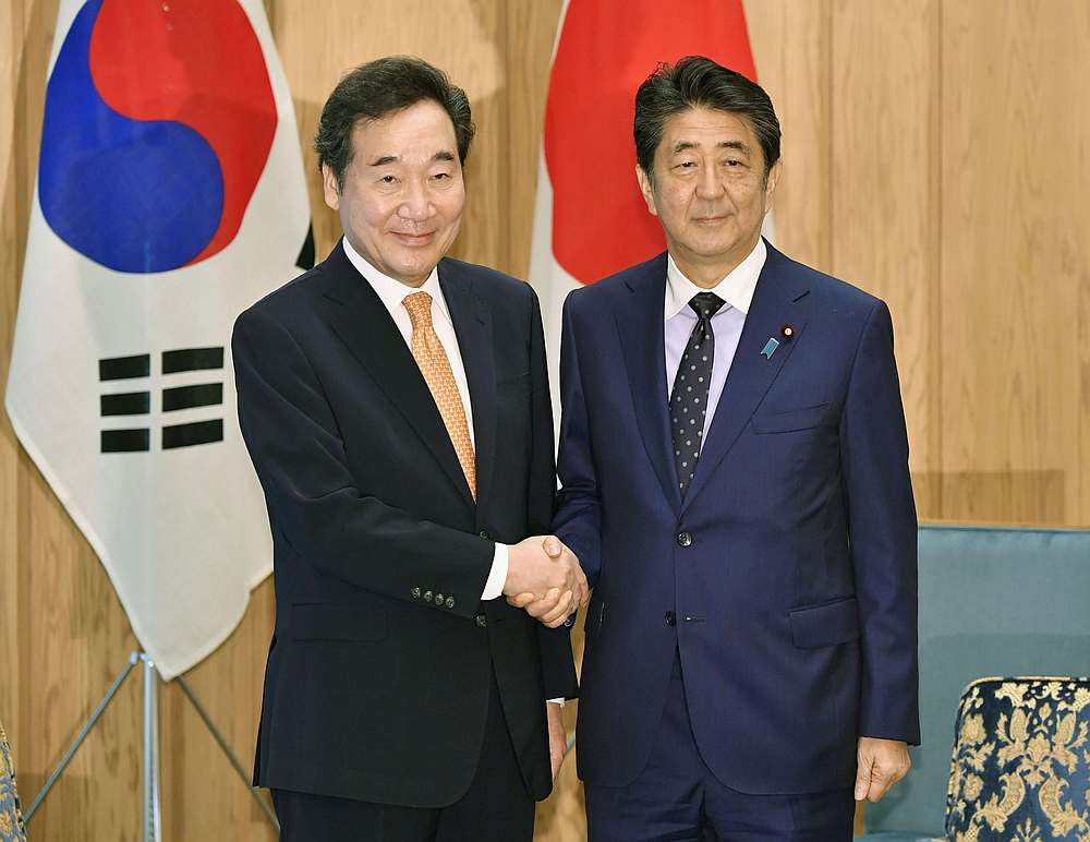 South Korean Prime Minister Lee Nak-yon (left) meets with Japan's Prime Minister Shinzo Abe in Tokyo October 24, 2019. u00e2u20acu201d Kyodo pic via Reuters