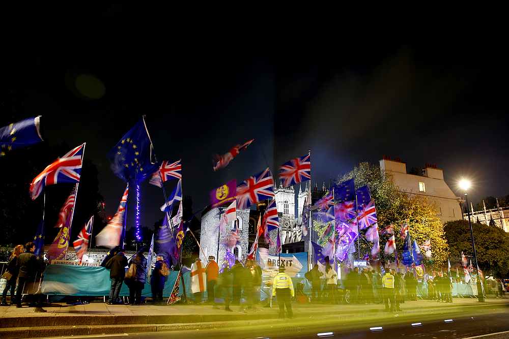 Anti and Pro-Brexit protesters demonstrate outside the Houses of Parliament in London, Britain October 28, 2019. u00e2u20acu201d Reuters pic taken with a slow shutter speed
