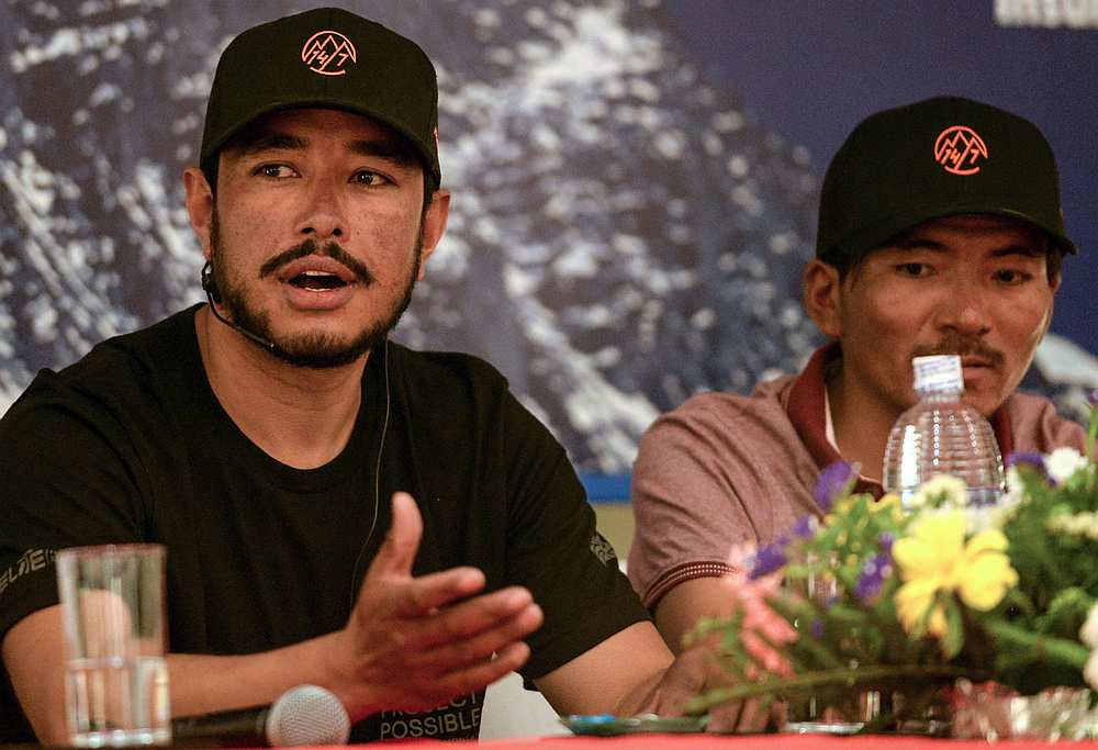 Mountaineer Nirmal Purja speaks as Nepali mountaineer Mingma David Sherpa (right) looks on during a press conference in Kathmandu. u00e2u20acu201d AFP pic