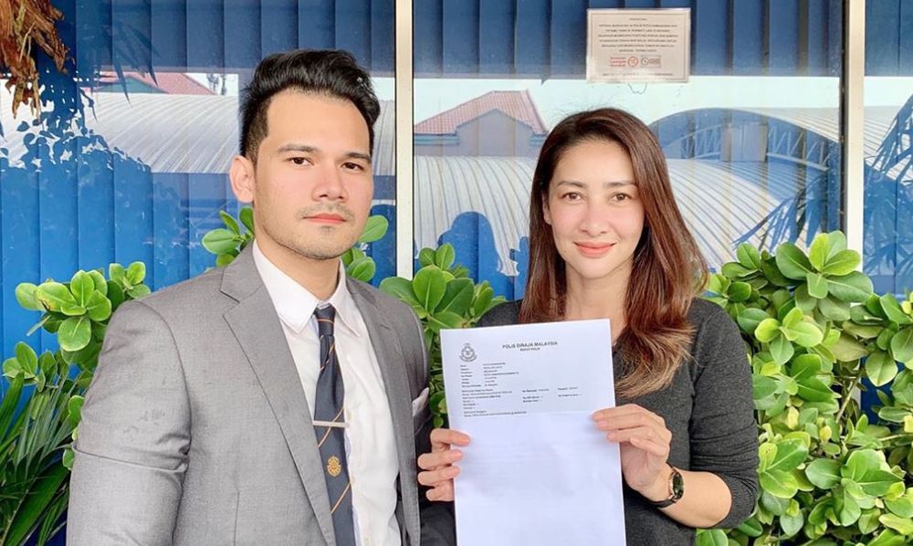 Rita (right) pictured with her lawyer Mohd Syakirin Syazwan after she lodged a police report against an Instagram user for alleged defamation. u00e2u20acu201d Picture from Instagram/ritrud727