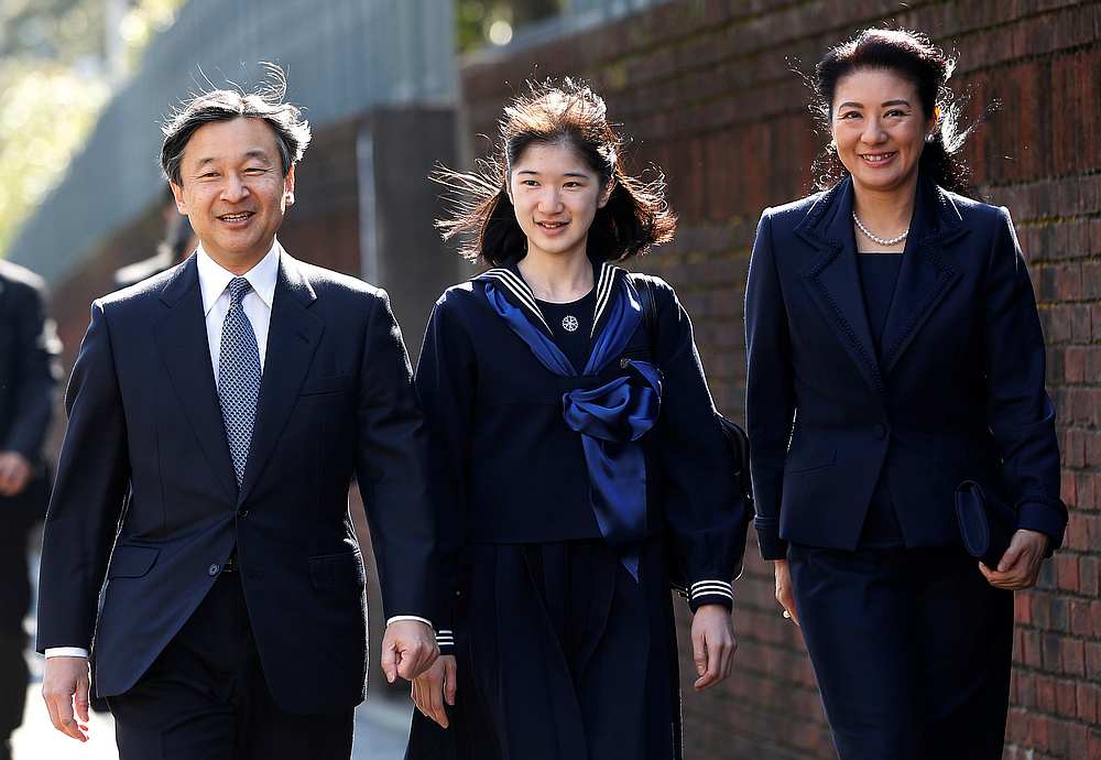 Japan's Princess Aiko (centre), accompanied by her parents now Emperor Naruhito and Empress Masako, arrives at her graduation ceremony at the Gakushuin Girls' Junior High School in Tokyo March 22, 2017. u00e2u20acu201d Reuters pic