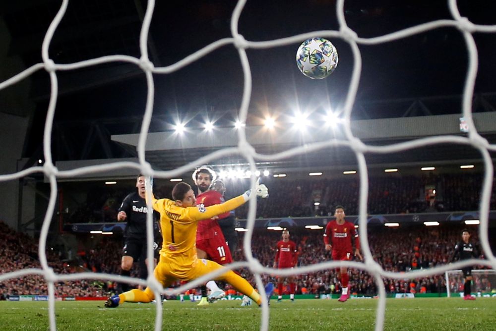 Liverpool's Mohamed Salah scores their fourth goal against Salzburg. u00e2u20acu201d Reuters pic