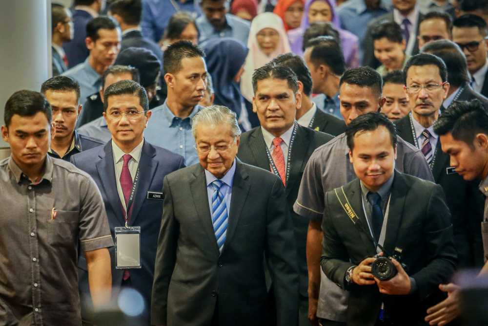 Prime Minister Tun Dr Mahathir Mohamad (centre) arrives at the launch of Shared Prosperity Vision 2030 in Kuala Lumpur October 5, 2019. u00e2u20acu2022 Picture by Hari Anggara