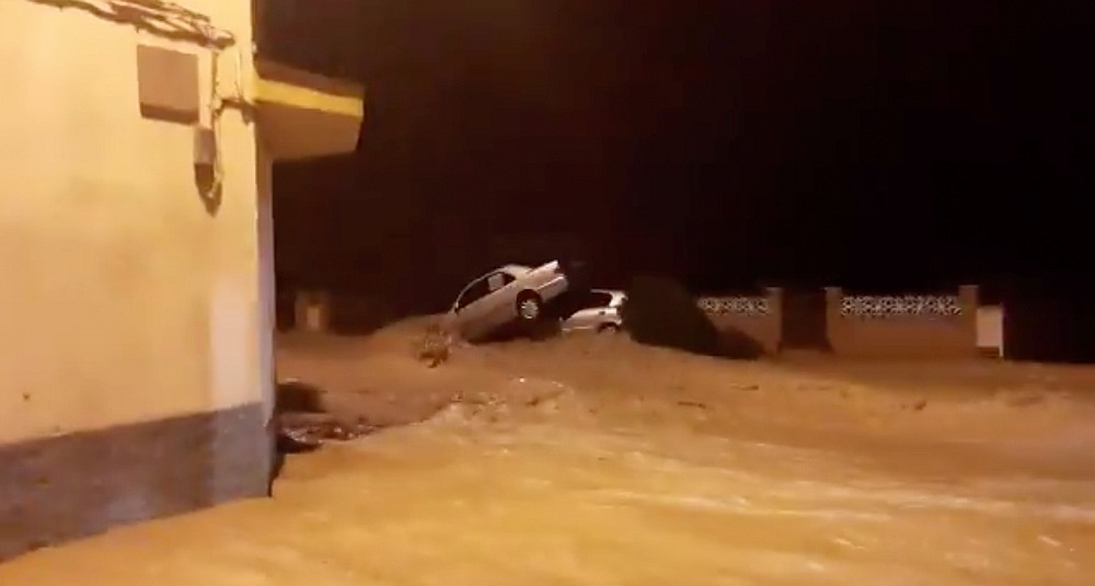 Cars are seen in flooded village of Arbeca, Spain October 22, 2019. u00e2u20acu201d David Bernat/social media video image via Reuters