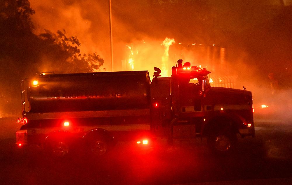 Los Angeles County fire tender is seen during wind-driven wildfire fire in Sylmar, California October 10, 2019. u00e2u20acu201d Reuters pic