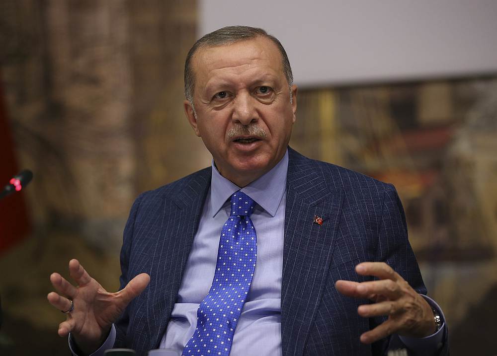 Turkish President Tayyip Erdogan talks to journalists in Istanbul October 13, 2019. u00e2u20acu201d Murat Kula/Presidential Press Office handout via Reuters