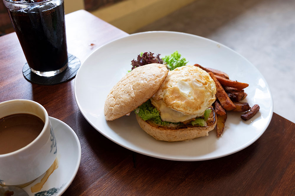 One of the options for lunch is a chicken burger, served here Toh Soon's famous coffee.