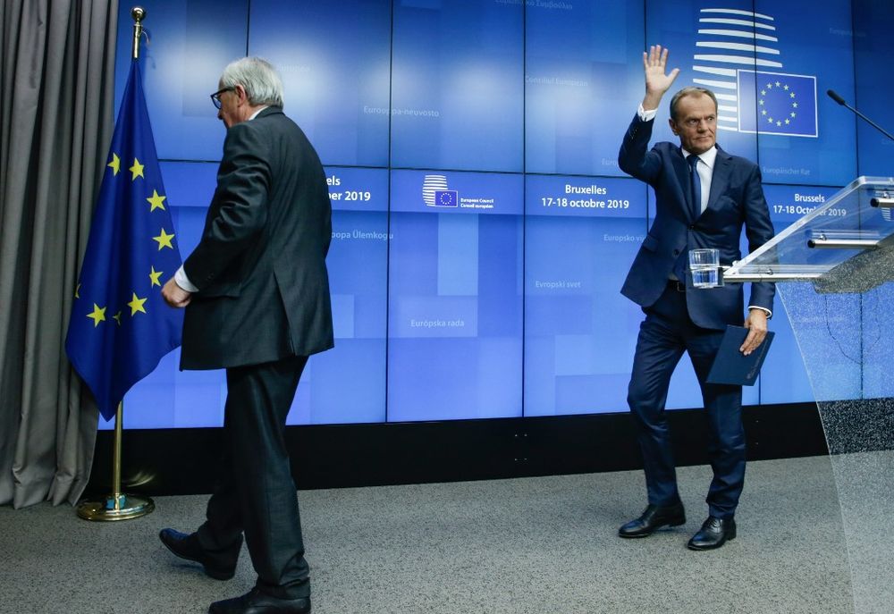 European Council President Donald Tusk (right) and European Commission President Jean-Claude Juncker depart after a press conference during a European Union Summit at EU Headquarters in Brussels, October 18, 2019. u00e2u20acu201d AFP pic