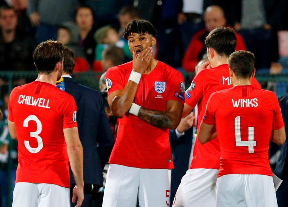 England's Tyrone Mings (centre) was one of several England players to report the abuse to match officials in England's 6-0 win over Bulgaria in Monday's Euro 2020 qualifier. u00e2u20acu2022 Reuters pic