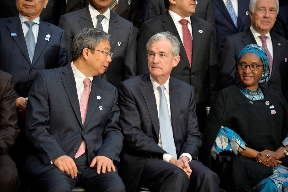 Peopleu00e2u20acu2122s Bank of China Governor Yi Gang, Federal Reserve Chairman Jerome Powell gather for a group photo during the IMF 2019 Annual Meetings of finance ministers and bank governors, in Washington, October 19, 2019. u00e2u20acu201d Reuters pic