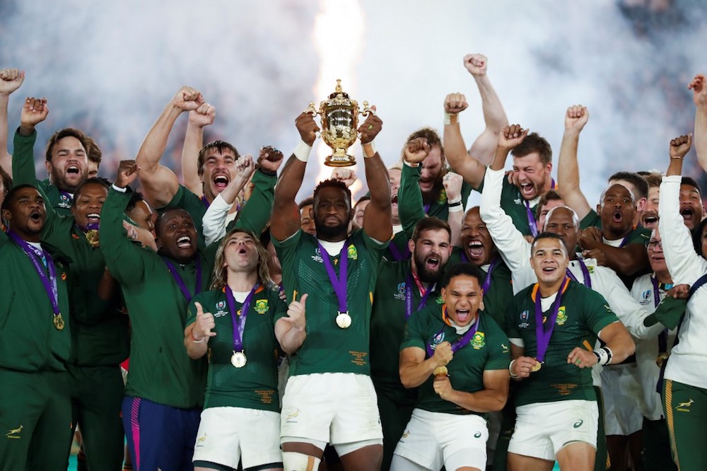 South Africau00e2u20acu2122s flanker Siya Kolisi (centre) lifts the Webb Ellis Cup as they celebrate winning the 2019 Rugby World Cup final with England in Yokohama November 2, 2019. u00e2u20acu201d AFP pic