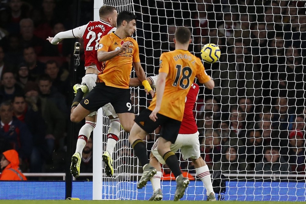 Wolverhampton Wanderers’ Raul Jimenez scores his team’s first goal during the Premier League match with Arsenal at Emirates Stadium in London November 2, 2019. — AFP pic