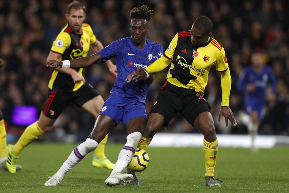 Chelseau00e2u20acu2122s Tammy Abraham is tackled by Watfordu00e2u20acu2122s Daryl Janmaat during their Premier League match at Vicarage Road Stadium in Watford November 2, 2019. u00e2u20acu201d AFP pic