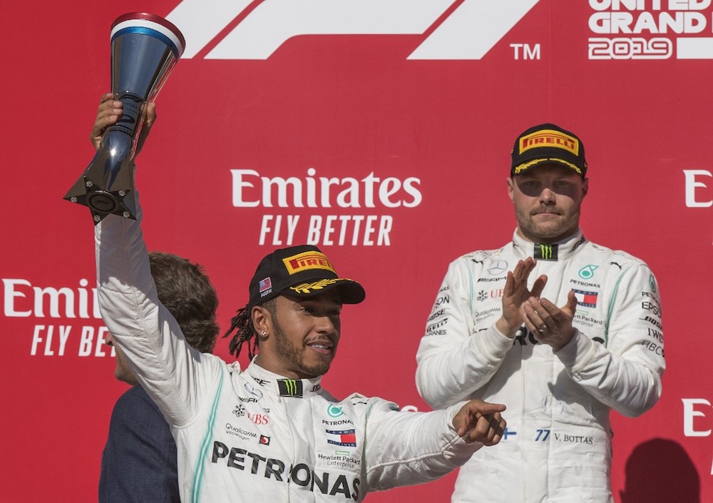 Lewis Hamilton of Great Britain with the Mercedes AMG Petronas F1 Team reacts after being crowned World Champion during his second-place finish, beside winner and teammate Valtteri Bottas, at the United States Grand Prix November 3, 2019. u00e2u20acu201d AFP pic