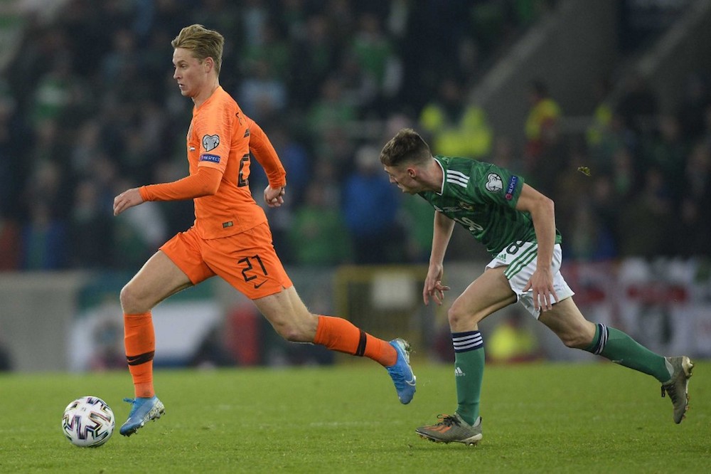 Netherlandsu00e2u20acu2122 Frenkie De Jong runs away from Northern Irelandu00e2u20acu2122s Gavin Whyte during their Euro 2020 qualification match at Windsor Park in Belfast November 16, 2019. u00e2u20acu201d AFP pic
