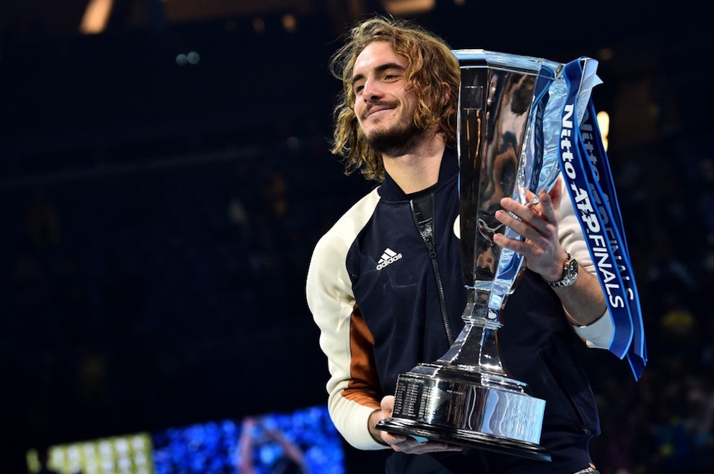 Greece's Stefanos Tsitsipas poses with the winner's trophy after the men's singles final match of the ATP World Tour Finals in London November 17, 2019. u00e2u20acu201d AFP pic