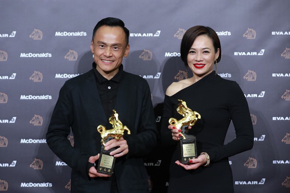 Taiwanese actor Chen Yi-wen and Malaysian actress Yeo Yann-yann pose with their trophies at the 56th Golden Horse film awards in Taipei November 23, 2019. u00e2u20acu201d AFP pic