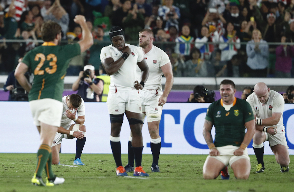 England's Maro Itoje, George Kruis and Dan Cole look dejected as South Africa celebrate winning the World Cup Final, November 2, 2019. u00e2u20acu201d Reuters pic