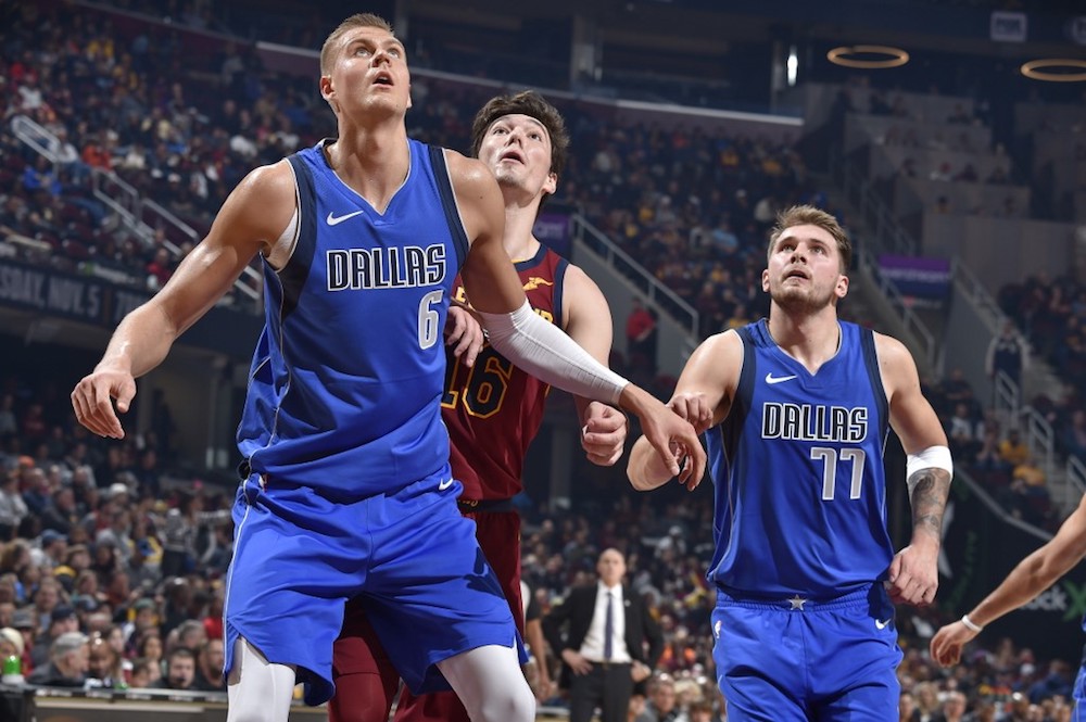 Kristaps Porzingis and Luka Doncic of the Dallas Mavericks play defence against Cedi Osman of the Cleveland Cavaliers at Quicken Loans Arena in Cleveland, Ohio November 3, 2019. u00e2u20acu201d AFP pic
