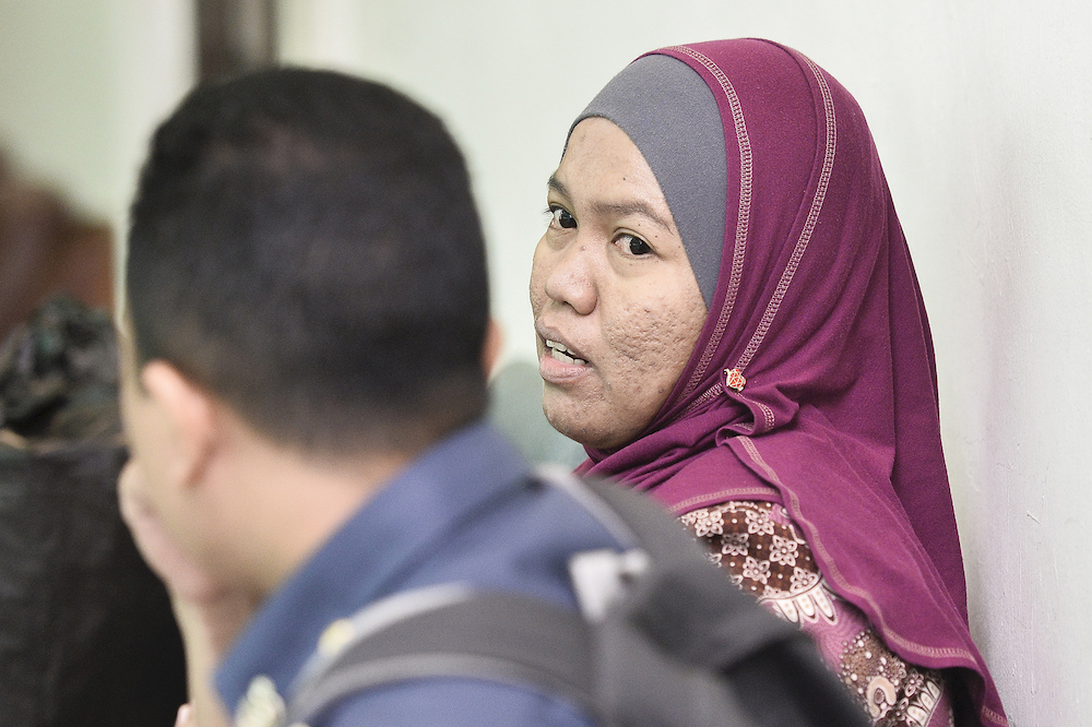 Former policewoman Nur Ronal Ardes Amir leaves court after attending the murder trial of Former Cradle Fund CEO at the Shah Alam High Court, November 15, 2019. u00e2u20acu201d Picture by Miera Zulyana