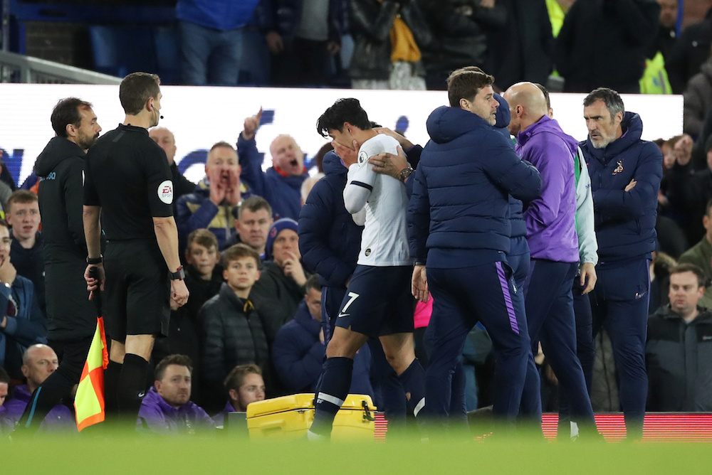 Tottenham Hotspur’s Son Heung-min is comforted by manager Mauricio Pochettino after being sent off during the Premier League match with Everton at Goodison Park in Liverpool November 3, 2019. — Action Images pic via Reuters