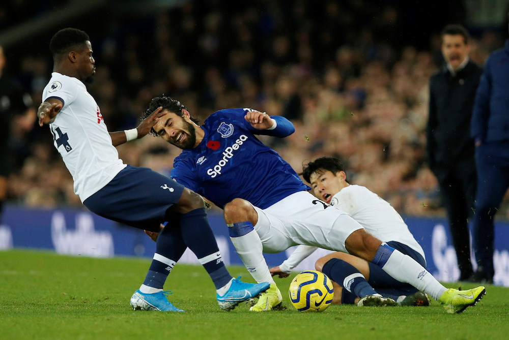 Evertonu00e2u20acu2122s Andre Gomes sustains an injury in action with Tottenham Hotspuru00e2u20acu2122s Serge Aurier and Son Heung-min during their Premier League match at Goodison Park in Liverpool November 3, 2019. u00e2u20acu201d Action Images pic via Reuters