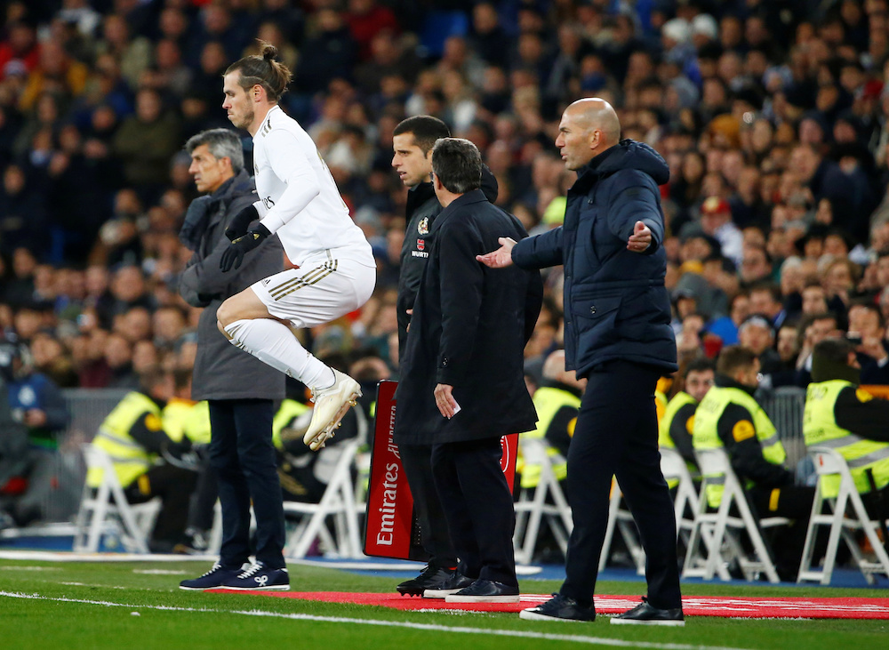 Real Madrid coach Zinedine Zidane reacts as Gareth Bale gets ready to come on as a substitute during the La Liga match with Real Sociedad at Santiago Bernabeu in Madrid November 23, 2019. u00e2u20acu201d Reuters pic