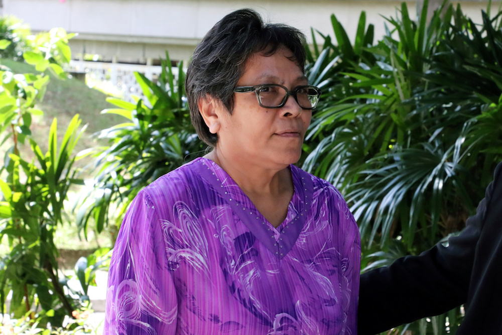 Australian Maria Elvira Pinto Exposto leaves following her acquitting at the Federal Court in Putrajaya November 26, 2019. u00e2u20acu201d Reuters pic