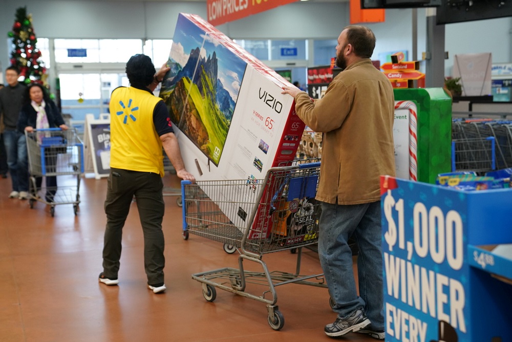 A man pushes a television in a shopping cart in Walmart on Black Friday, a day that kicks off the holiday shopping season, in King of Prussia, Pennsylvania November 29, 2019. u00e2u20acu201d Reuters pic