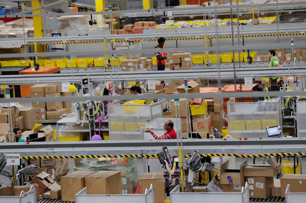 Amazon workers perform their jobs inside of an Amazon fulfilment centre on Cyber Monday in Robbinsville, New Jersey December 2, 2019. u00e2u20acu201d Reuters pic
